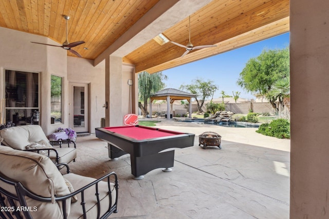6428 W Eugie Ave, Glendale, AZ 85304 - view of patio featuring ceiling fan, a gazebo, and an outdoor fire pit