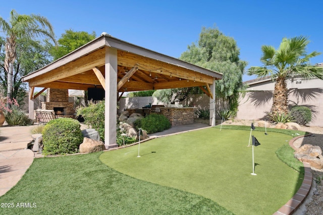 6428 W Eugie Ave, Glendale, AZ 85304 - view of home's community with a gazebo, a fenced backyard, a putting green, and a patio
