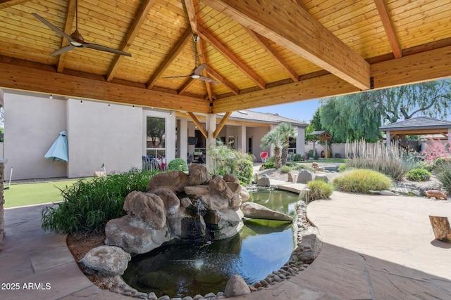 6428 W Eugie Ave, Glendale, AZ 85304 - view of patio with a gazebo, a small pond, and a ceiling fan