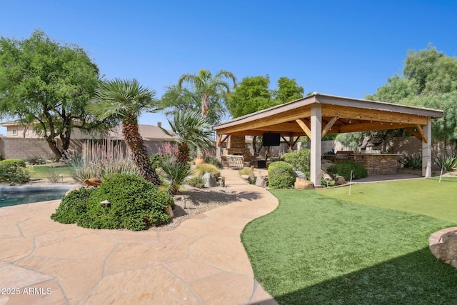 6428 W Eugie Ave, Glendale, AZ 85304 - view of community featuring a gazebo, an area to practice putting, and a patio area