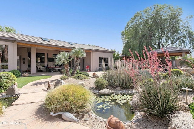 6428 W Eugie Ave, Glendale, AZ 85304 - view of yard featuring a garden pond, a patio, and a gazebo