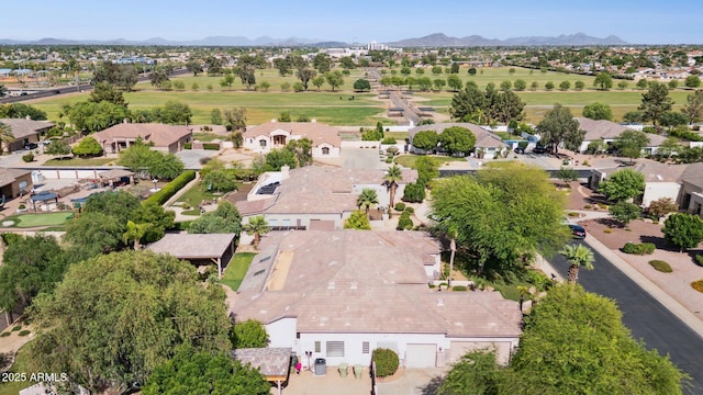 6428 W Eugie Ave, Glendale, AZ 85304 - aerial view of property and surrounding area featuring nearby suburban area and a mountainous background