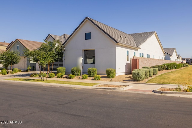 10127 E Tillman Ave, Mesa, AZ 85212 - view of front of house with stucco siding and fence