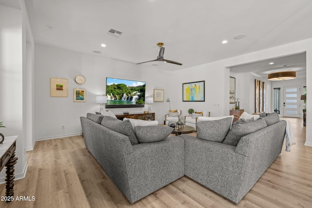 10127 E Tillman Ave, Mesa, AZ 85212 - living room with light wood-style floors, recessed lighting, and baseboards