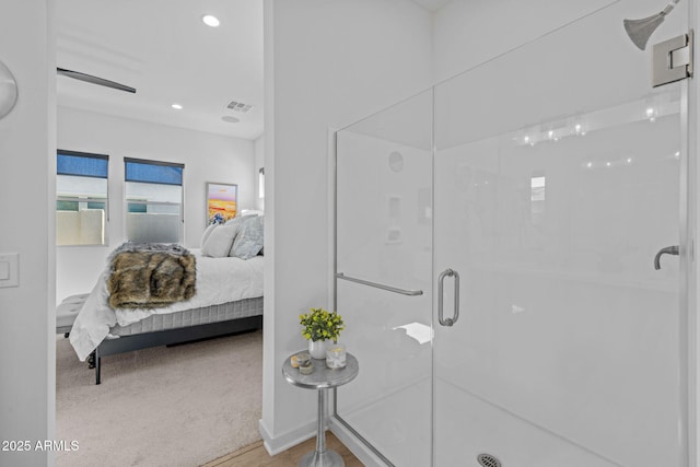 10127 E Tillman Ave, Mesa, AZ 85212 - ensuite bathroom featuring a stall shower, recessed lighting, and baseboards