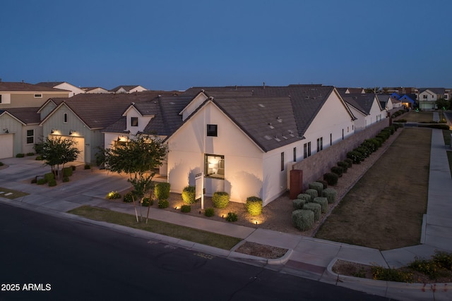 10127 E Tillman Ave, Mesa, AZ 85212 - view of front of home with concrete driveway, stucco siding, and a residential view