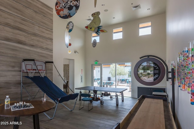 10127 E Tillman Ave, Mesa, AZ 85212 - recreation room with a high ceiling, wood finished floors, and recessed lighting