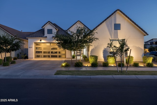 10127 E Tillman Ave, Mesa, AZ 85212 - view of front of house featuring stucco siding, concrete driveway, and an attached garage