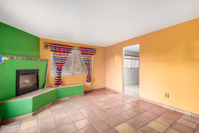 empty room featuring tile patterned floors