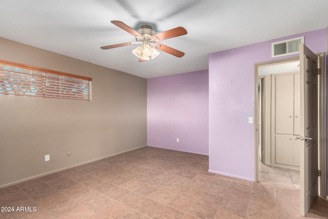 spare room featuring ceiling fan