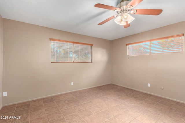 empty room featuring ceiling fan