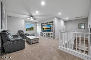 living room with a wealth of natural light, recessed lighting, ceiling fan, and carpet floors
