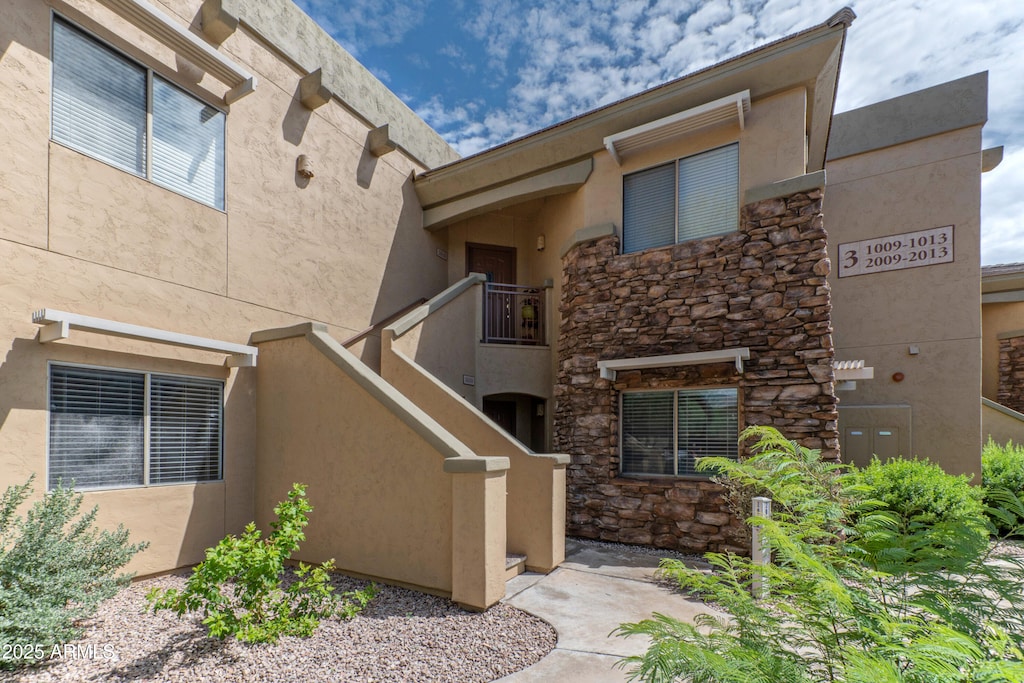 view of property with stairway