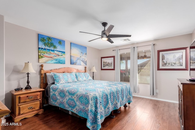 bedroom with dark wood-type flooring and ceiling fan