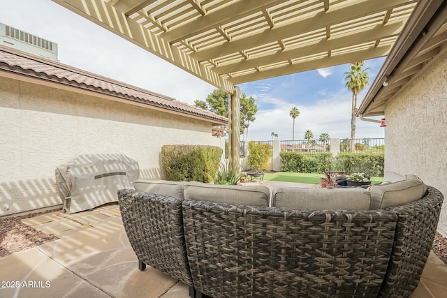 view of patio featuring a grill, fence, outdoor lounge area, and a pergola