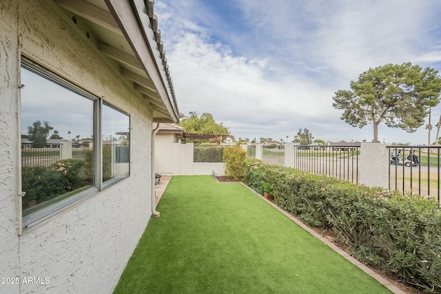 view of yard featuring a fenced backyard