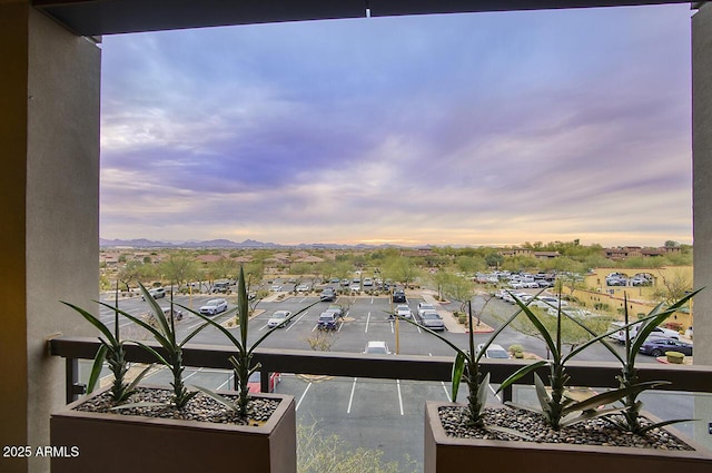 balcony featuring a mountain view