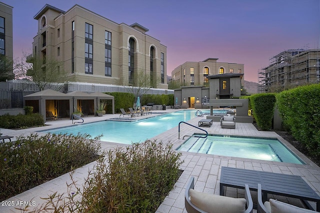 pool featuring a patio and fence