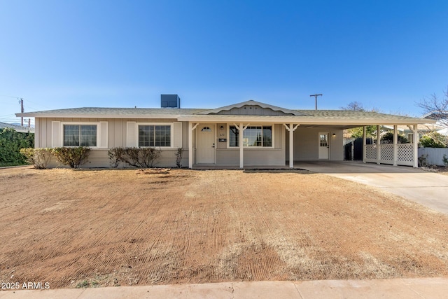 single story home with a carport