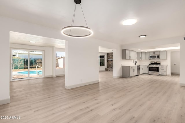 unfurnished living room featuring light hardwood / wood-style floors