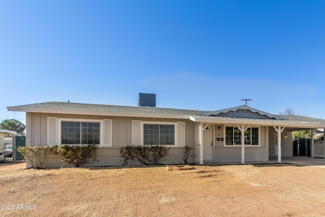 ranch-style house with a carport