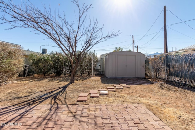 view of patio with a shed