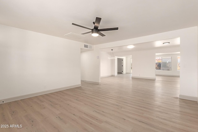 unfurnished room featuring ceiling fan and light wood-type flooring