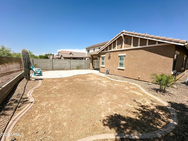 view of yard with a patio area