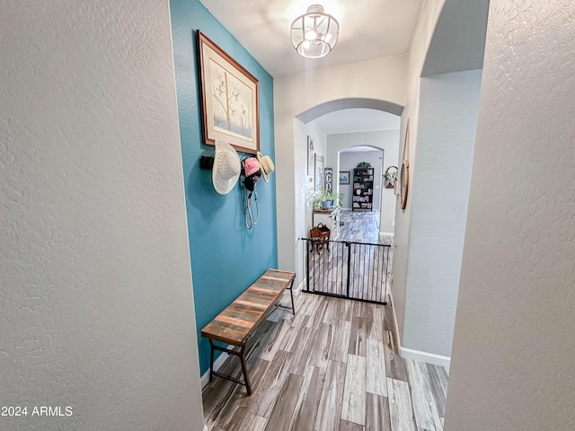 corridor featuring hardwood / wood-style flooring