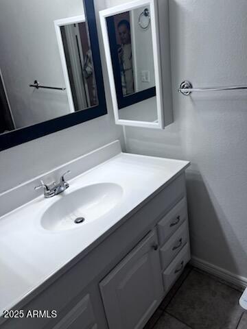 8055 E Thomas Rd Unit H103, Scottsdale, AZ 85251 - bathroom featuring vanity and tile patterned flooring