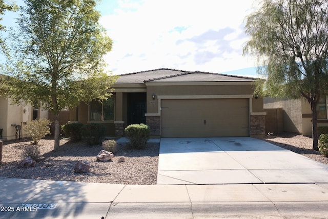 view of front of house with stone siding, driveway, an attached garage, and stucco siding