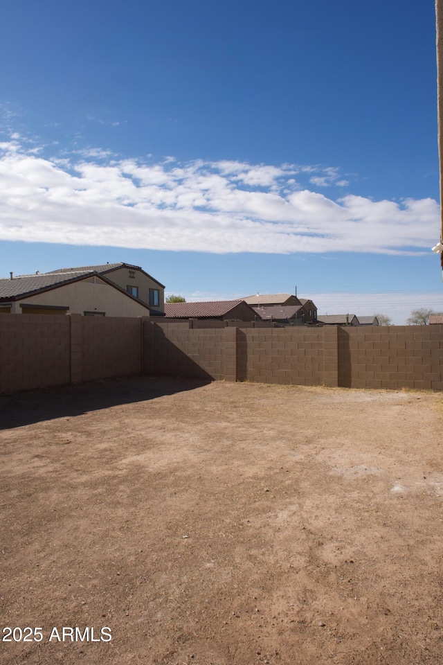 view of yard featuring fence