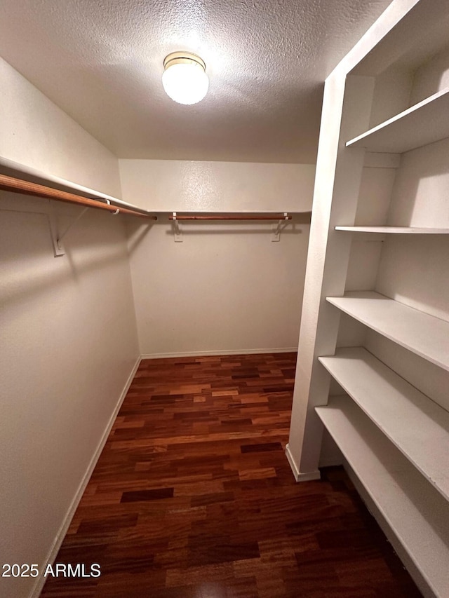 1836 N Stapley Dr Unit 88, Mesa, AZ 85203 - walk in closet featuring wood finished floors