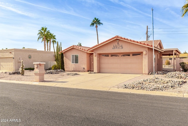 view of front of property with a garage