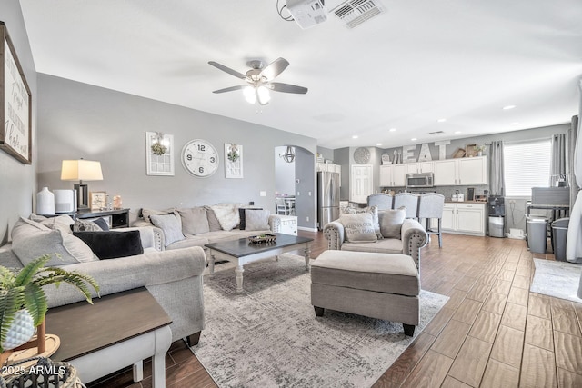 living room with ceiling fan