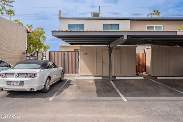 exterior space with a gate and fence