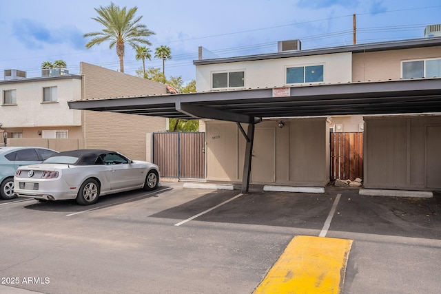 covered parking lot with fence