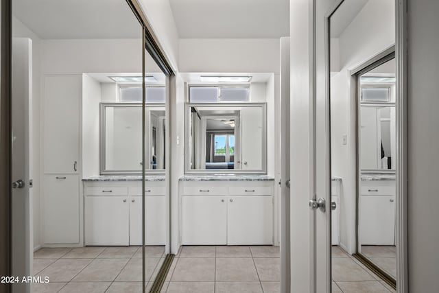 bathroom featuring tile flooring