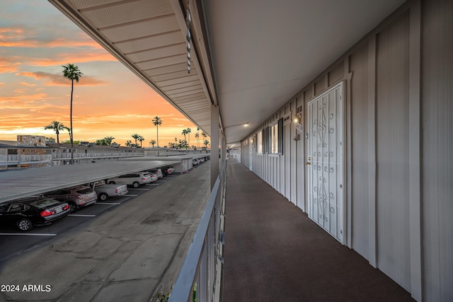 view of balcony at dusk