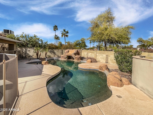 view of pool with a fenced in pool, a patio, central AC, and a fenced backyard