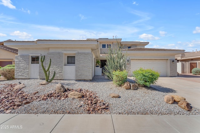 3806 E Taurus Pl, Chandler, AZ 85249 - prairie-style home featuring concrete driveway, a garage, stone siding, and stucco siding