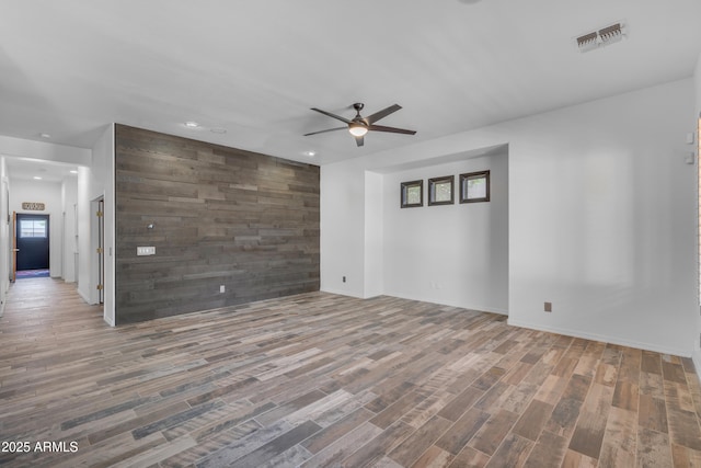 3806 E Taurus Pl, Chandler, AZ 85249 - spare room featuring a ceiling fan, wood finished floors, recessed lighting, and baseboards