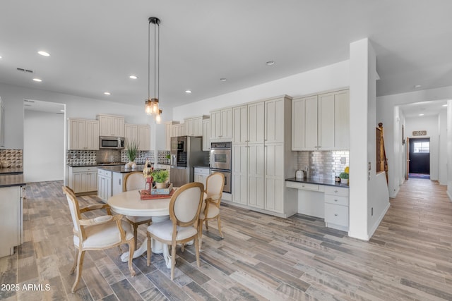 3806 E Taurus Pl, Chandler, AZ 85249 - dining room featuring light wood-style floors and recessed lighting