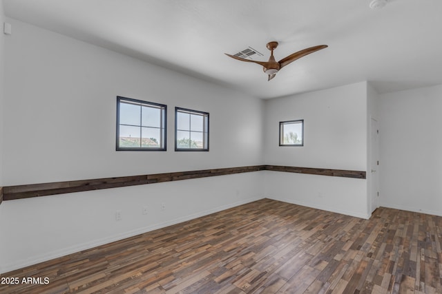 3806 E Taurus Pl, Chandler, AZ 85249 - unfurnished room with wood finished floors, ceiling fan, and baseboards