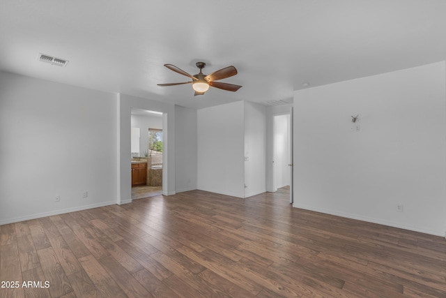 3806 E Taurus Pl, Chandler, AZ 85249 - empty room featuring hardwood / wood-style flooring, a ceiling fan, and baseboards
