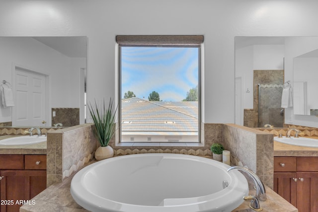 3806 E Taurus Pl, Chandler, AZ 85249 - full bathroom featuring a garden tub, a stall shower, and two vanities