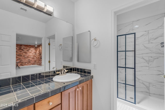 3806 E Taurus Pl, Chandler, AZ 85249 - bathroom featuring a marble finish shower and vanity
