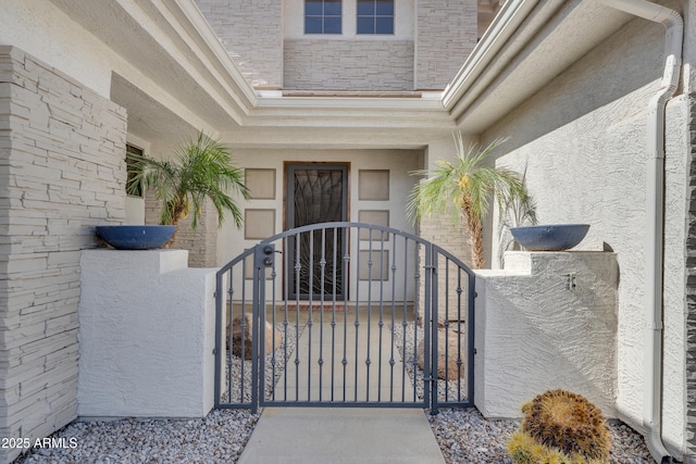 3806 E Taurus Pl, Chandler, AZ 85249 - entrance to property featuring a gate and stucco siding