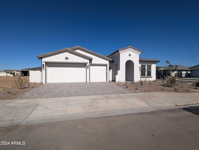 view of front of property featuring a garage