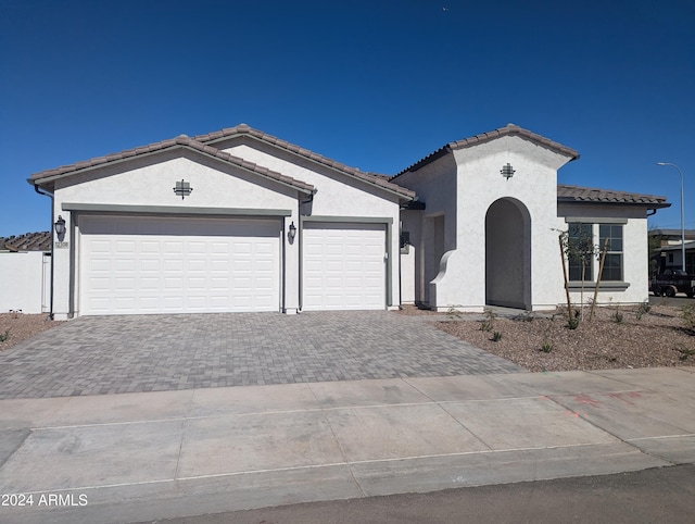 view of front of property with a garage